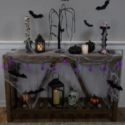 Northlight LED Lighted Spider Halloween Lights - 6' Black Wire - Purple Lights - 10ct